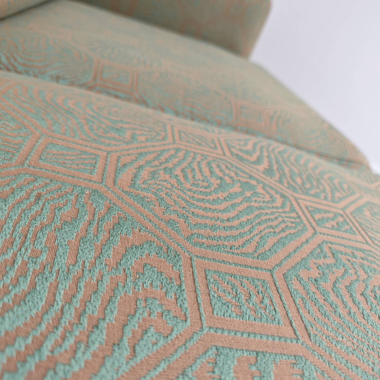 Pierre Frey modernist bench in green and gold patterned fabric