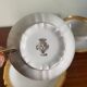 Pair of gold porcelain tea cups