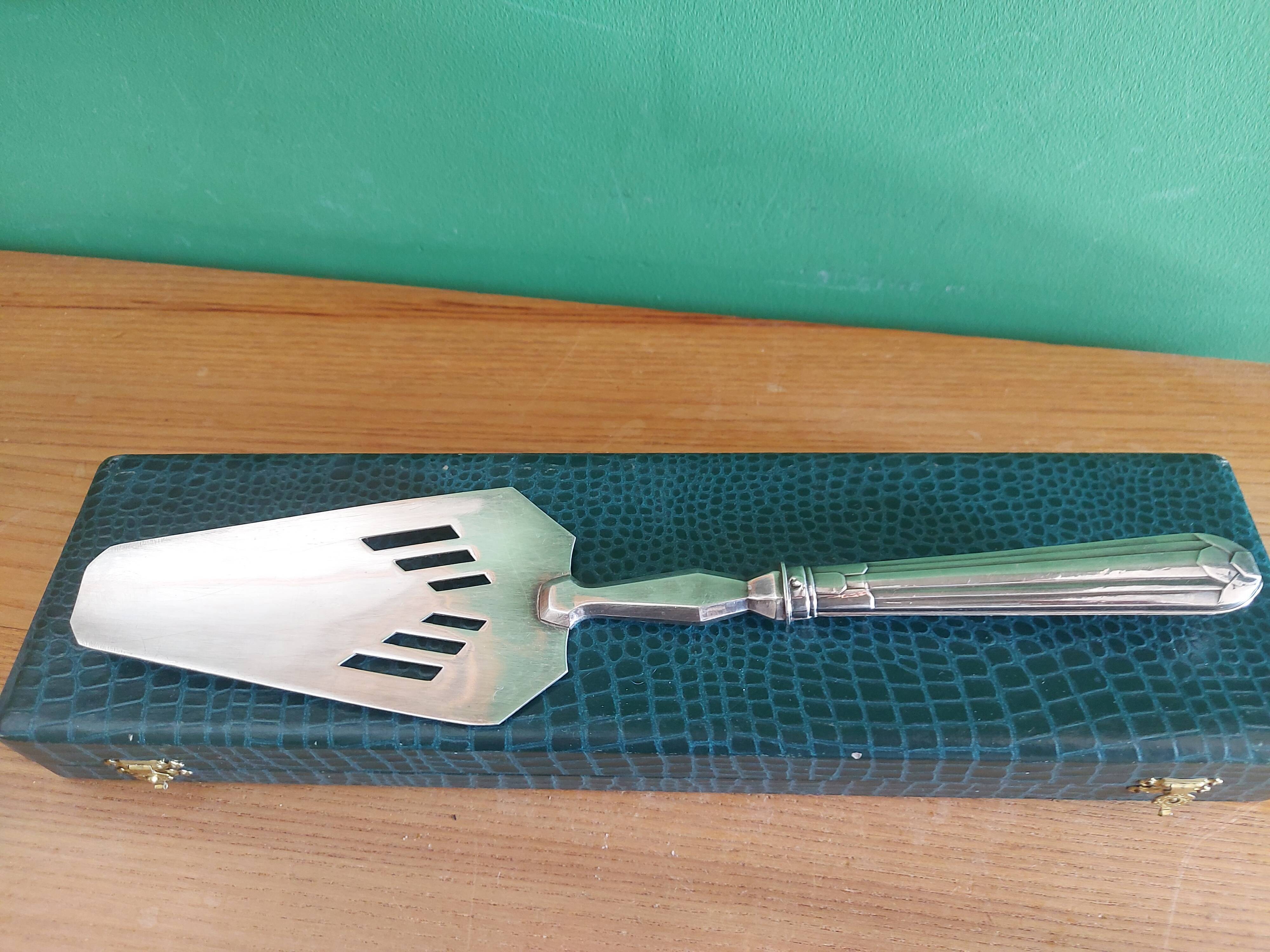 Filled silver shovel , art deco