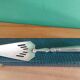 Filled silver shovel , art deco