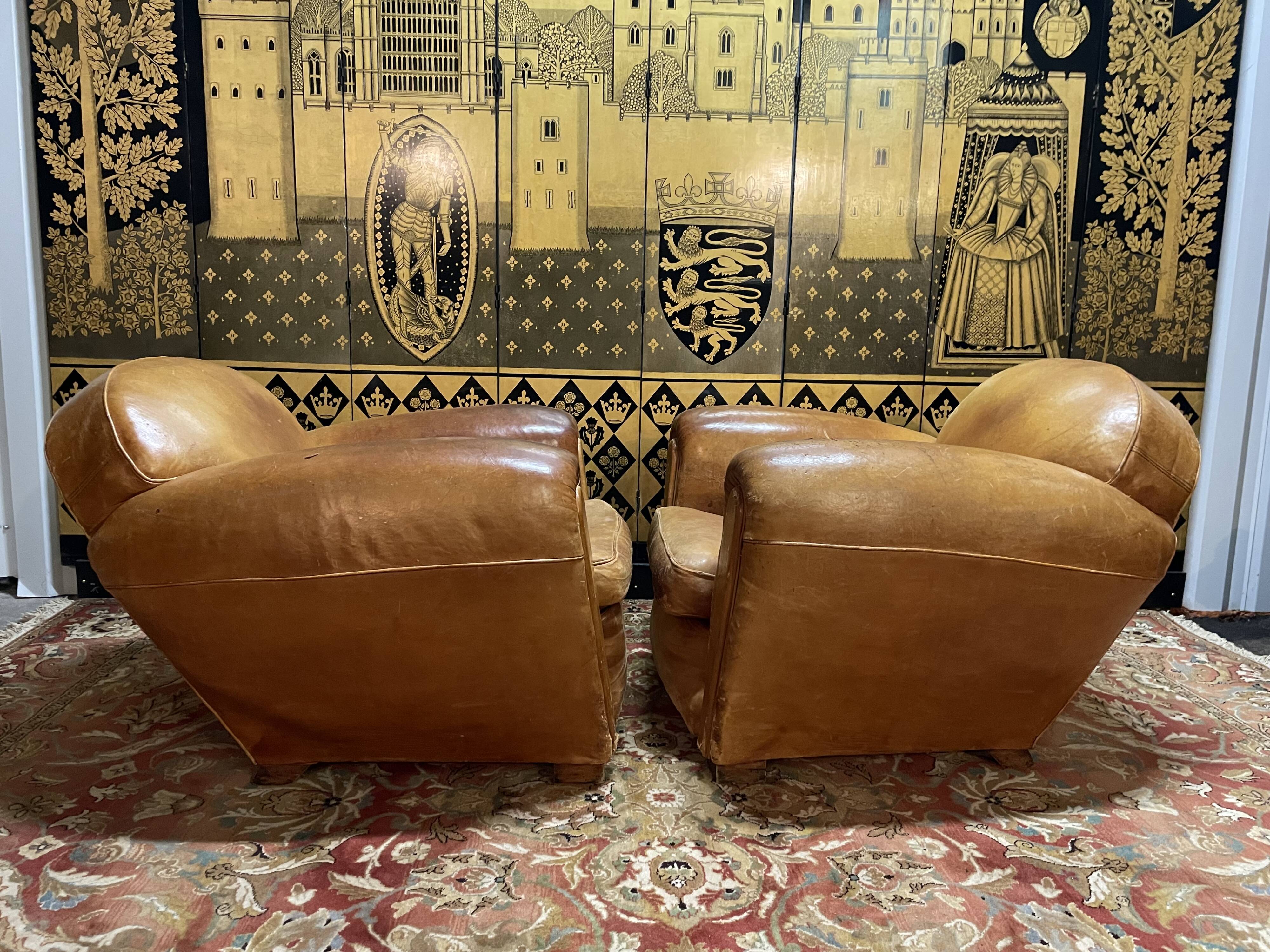 Pair of club armchairs in Havana leather 1950