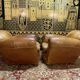 Pair of club armchairs in Havana leather 1950