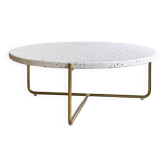 Anatole coffee table in terrazzo and confetti metal by the brand Tikamoon.
