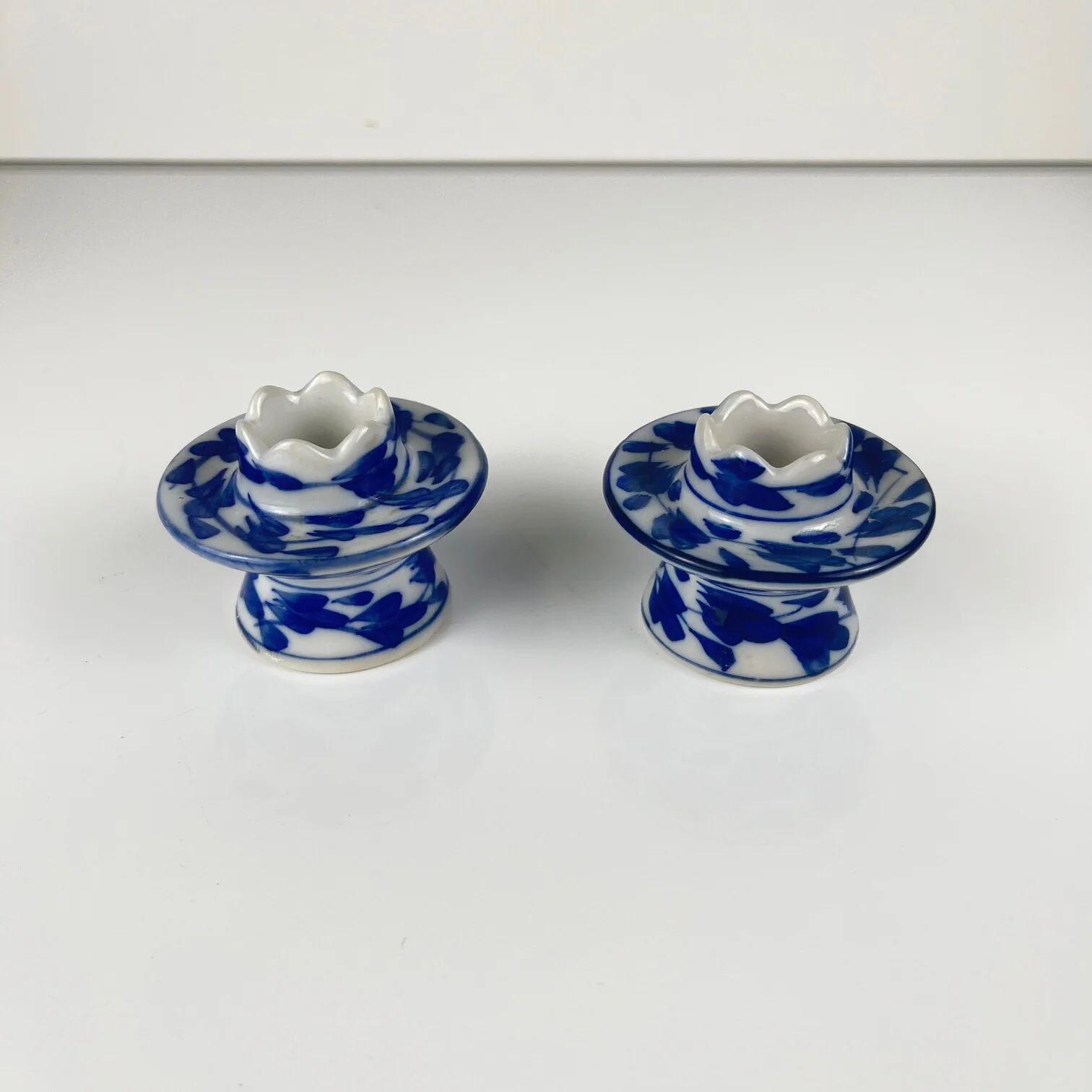 Set of 2 blue and white porcelain candlesticks, 20th century.