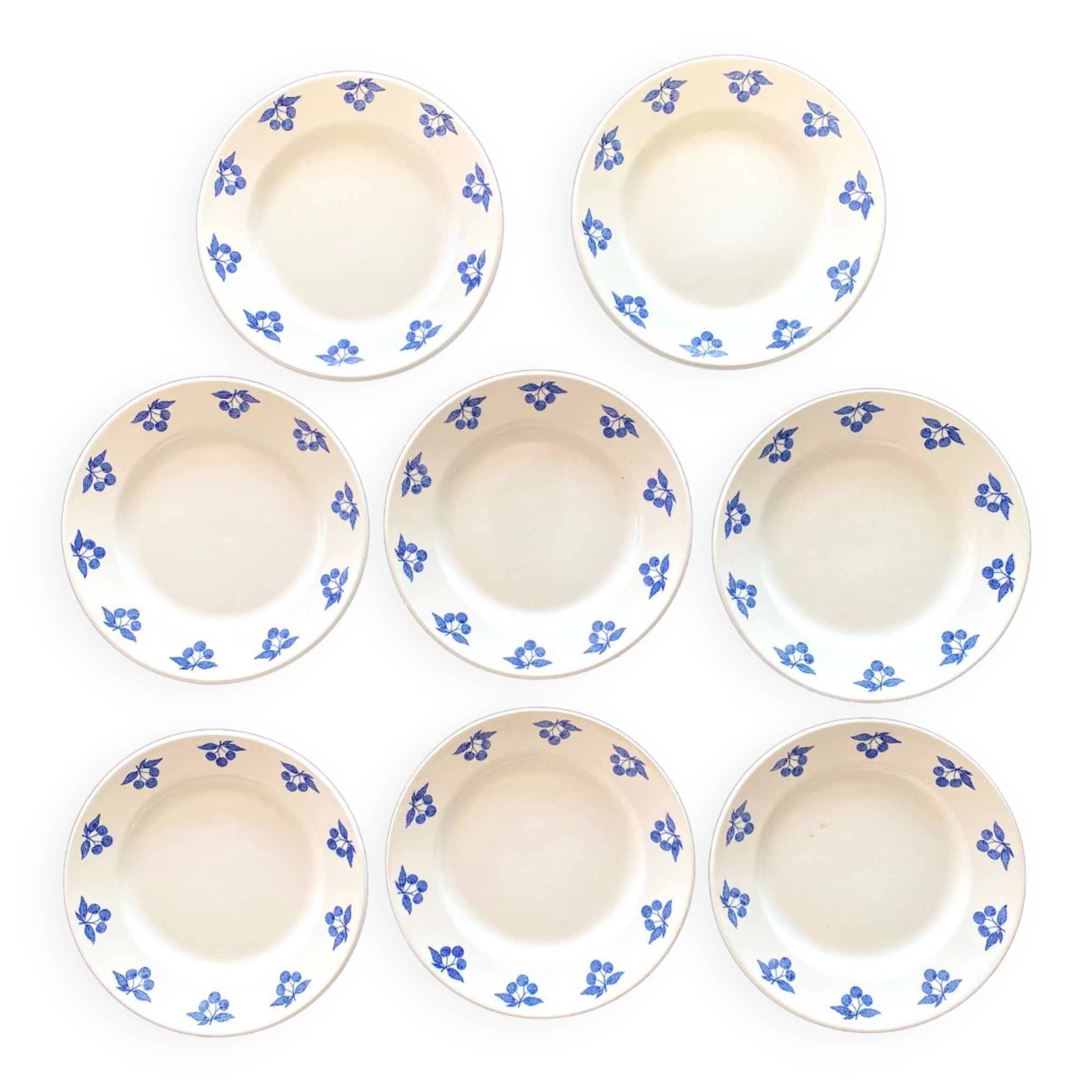 Set of eight dessert plates – blue cherry patterns – stamped