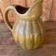 Old ceramic jug in the shape of a gourd by Louis Lourioux