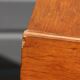 Dark chest of drawers with 5 drawers from the 1950s