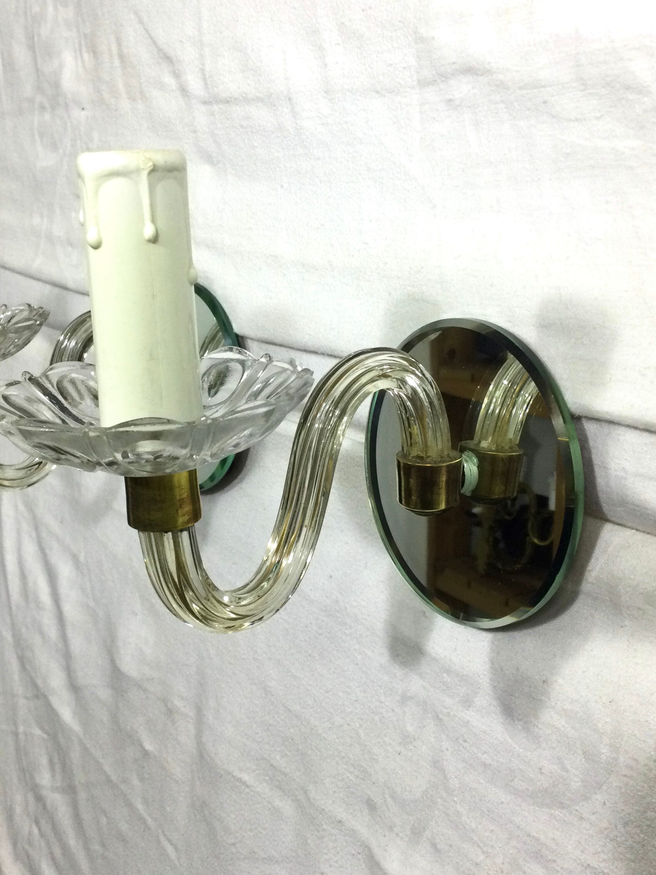 Pair of glass and mirror sconces