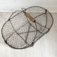 Basket in metal and old wood