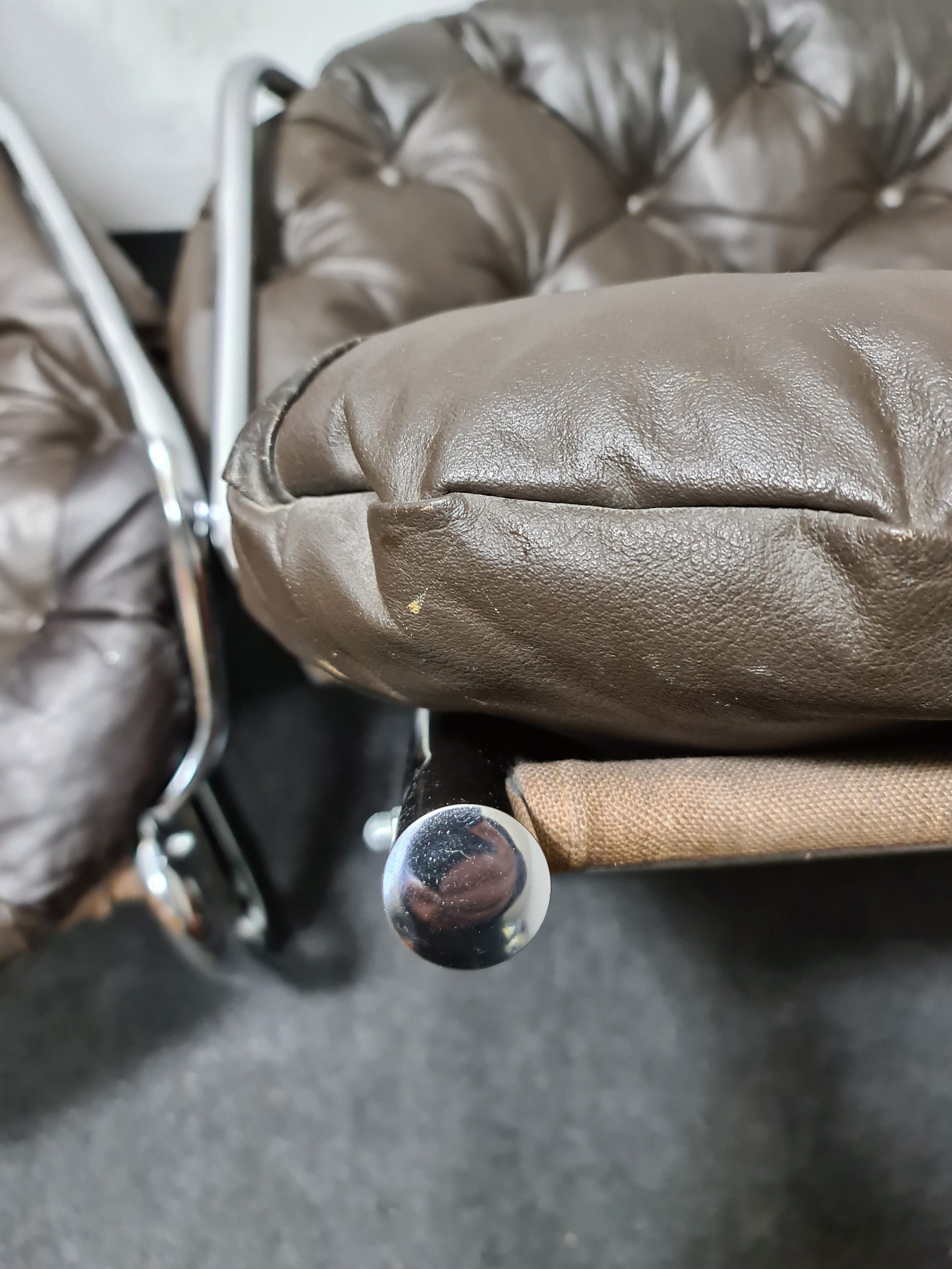 Pair of chrome and leather vintage chairs