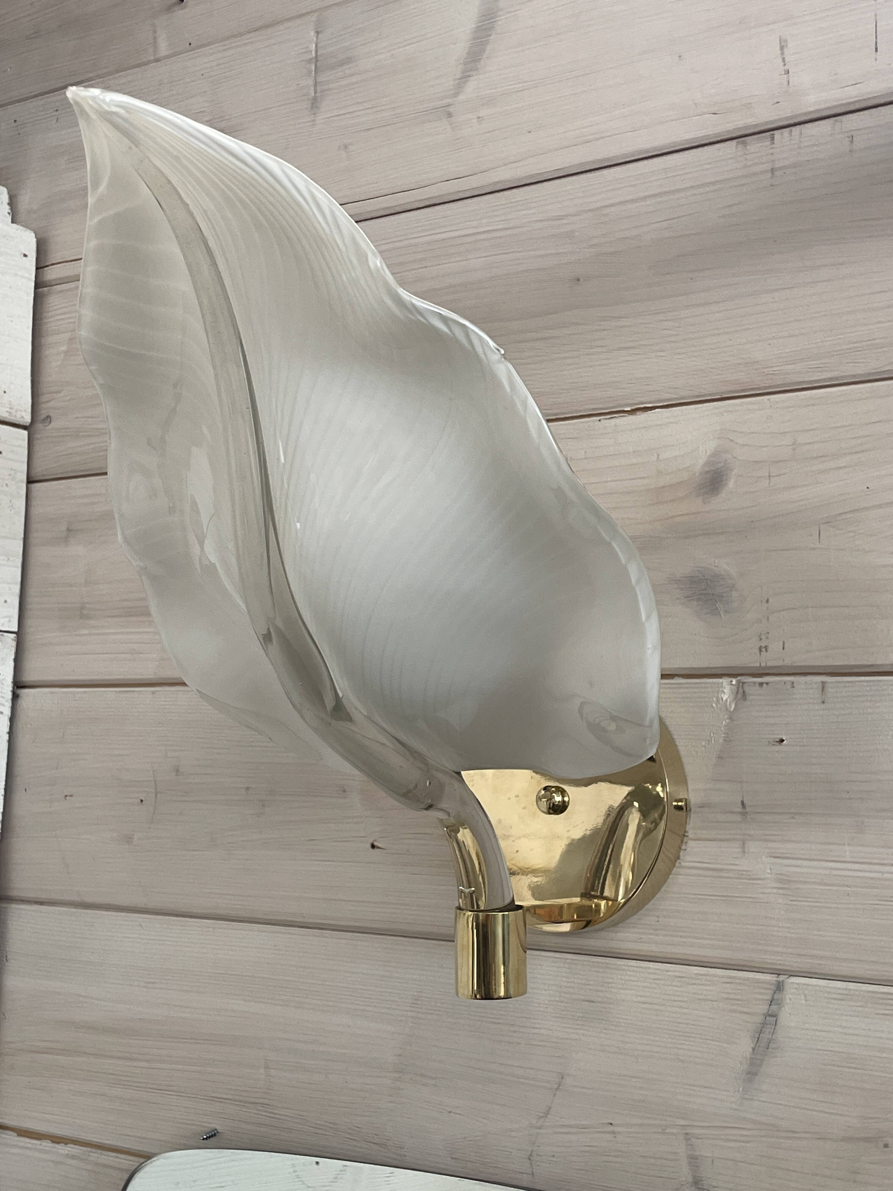 Set of 3 Murano glass wall lamps in white and brass, 1970s.