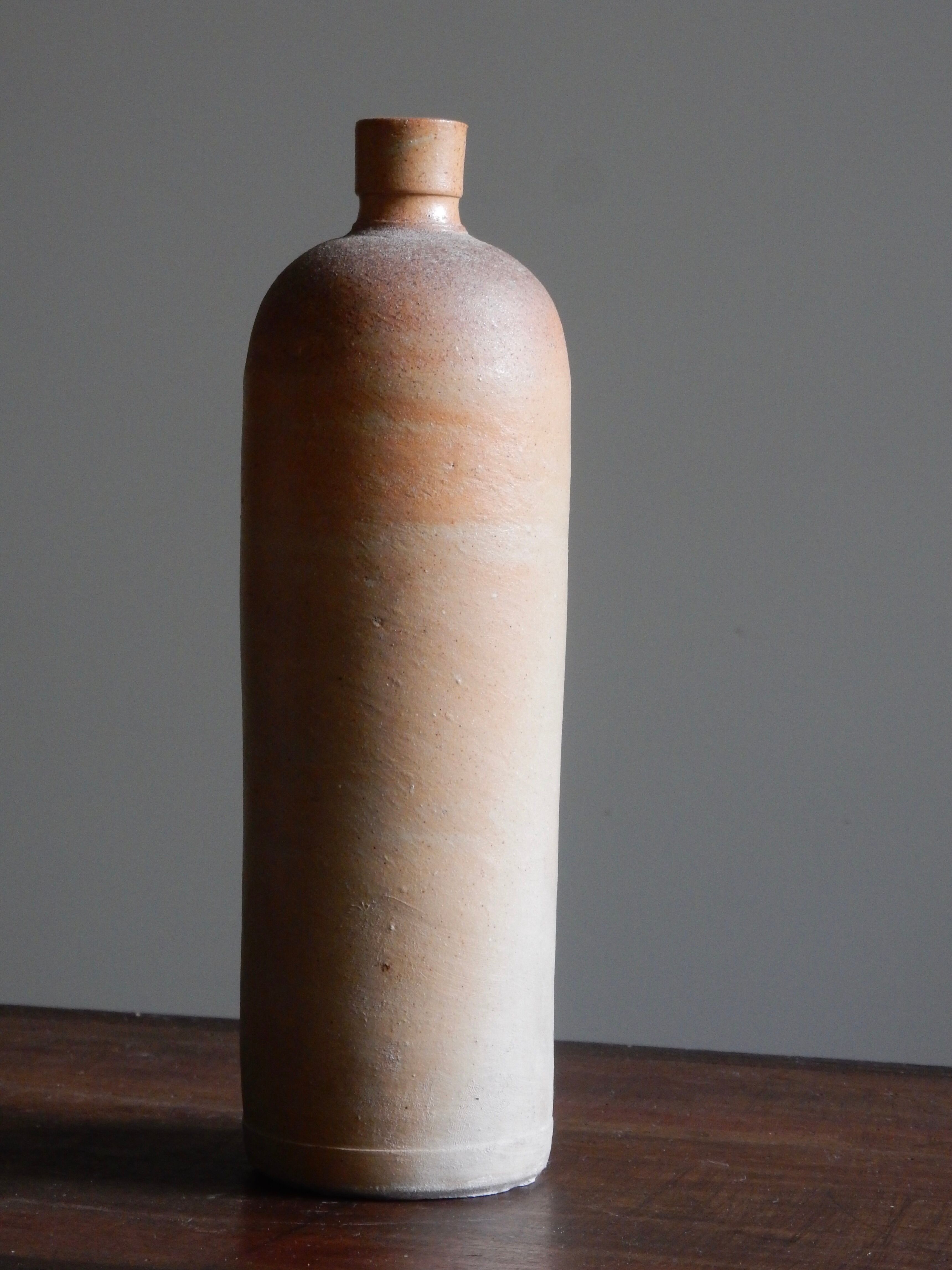 Old matte sandstone bottle