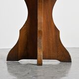 Solid pine table, sculpted cross legs, French Alps, around 1970.