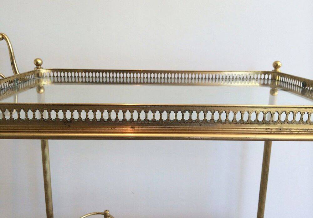 Neoclassical brass trolley with removable trays.