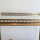 Neoclassical brass trolley with removable trays.