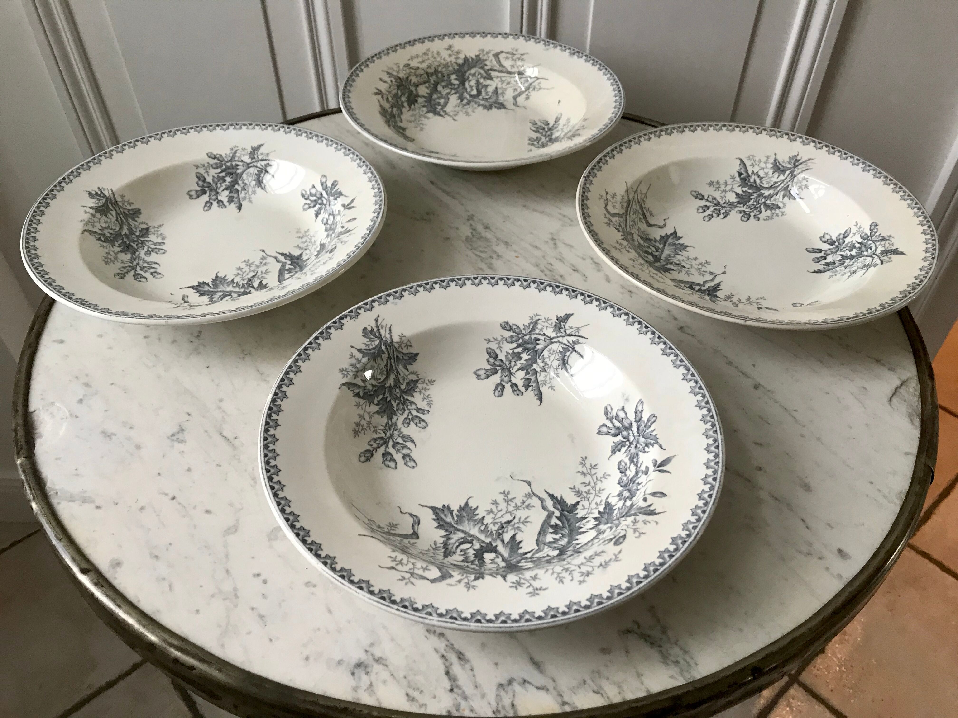 4 hollow plates Terre de Fer Company Ceramics model Thistle made in Holland late nineteenth