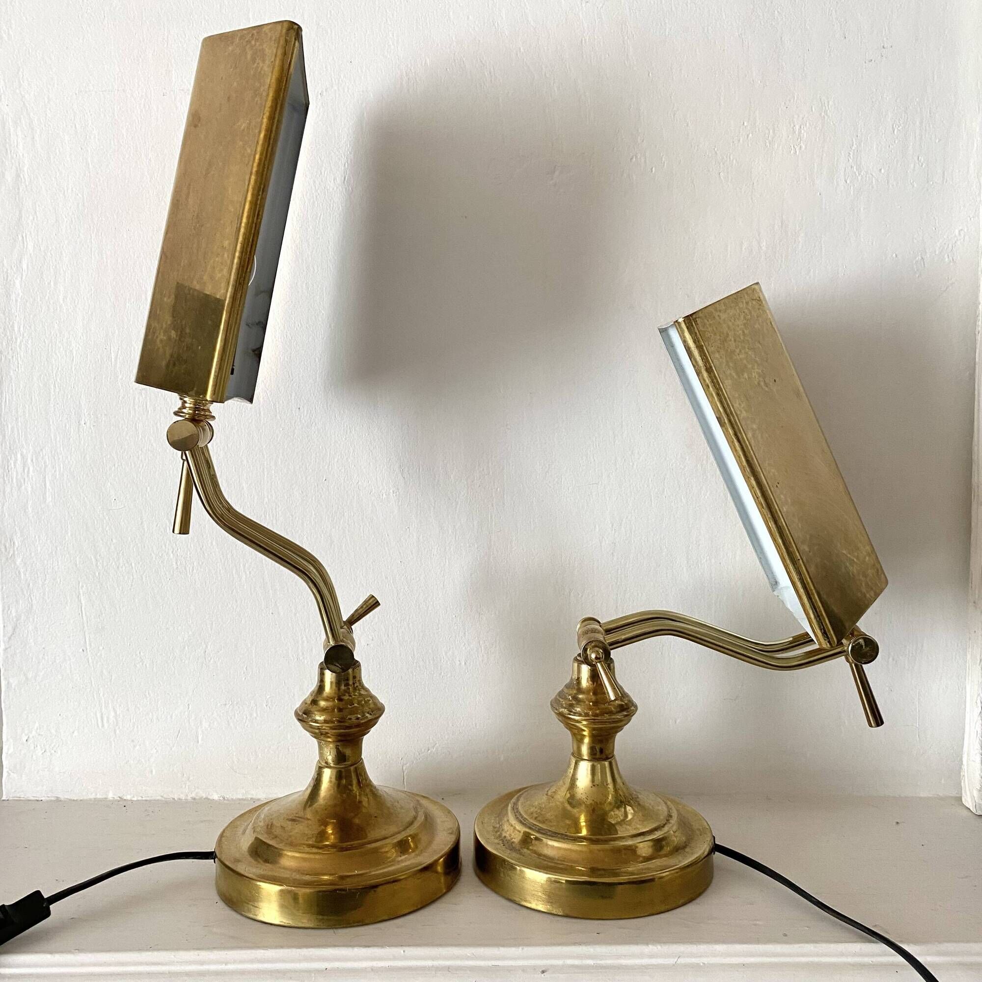Pair of notary-style lamps in gilded metal