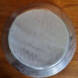 Large round hollow metal dish