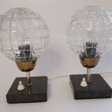 A pair of bedside lamps