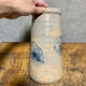 Ceramic vase with blue flowers