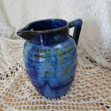 Antique pitcher in enamelled ceramic