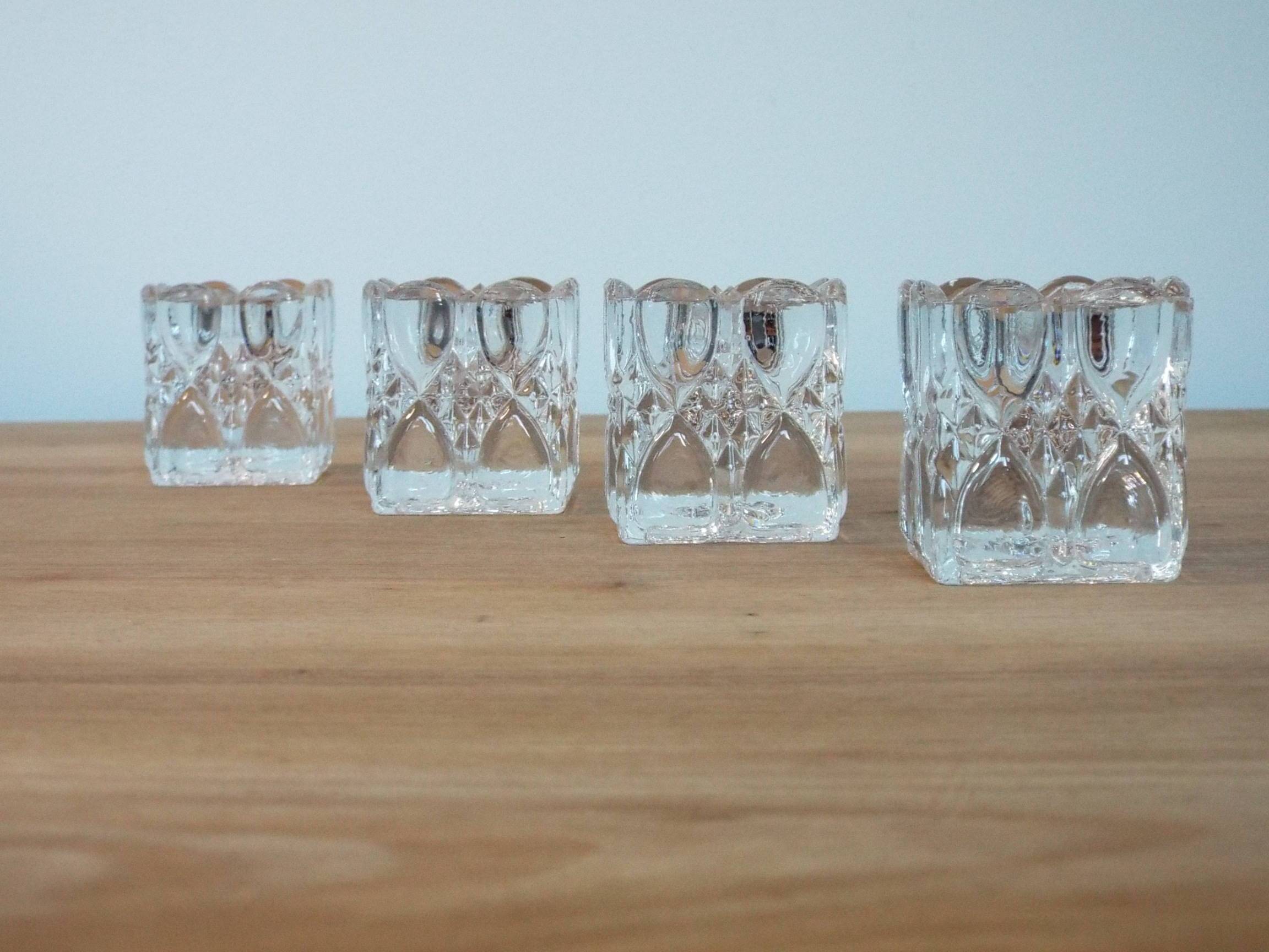 4 bougeoirs en verre ciselé