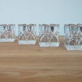 4 bougeoirs en verre ciselé