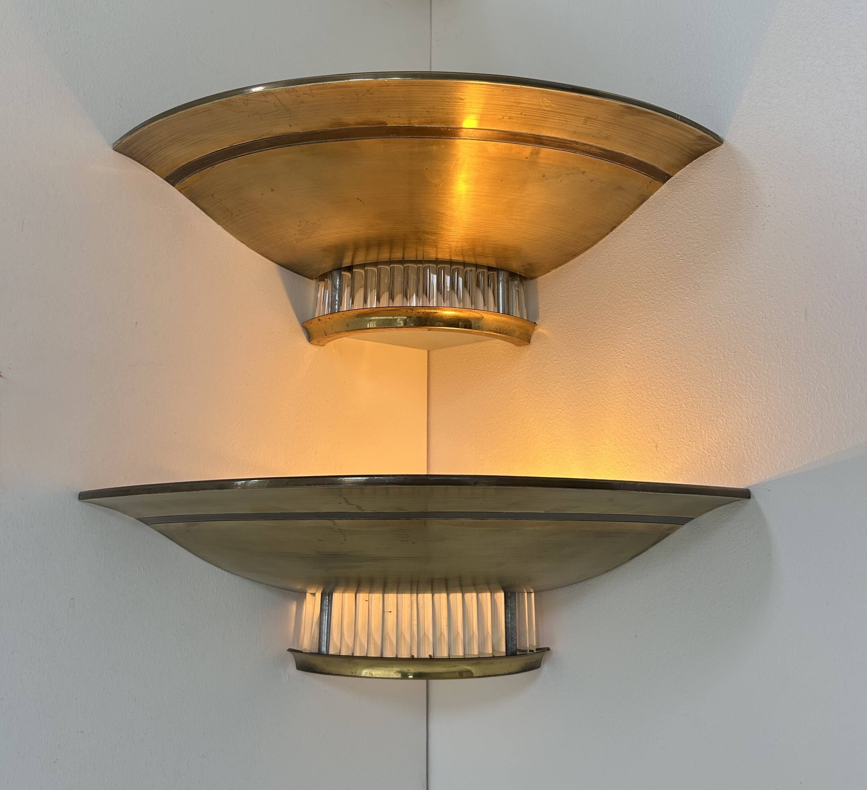Pair of Art Deco corner sconces, brass and glass, France 1930
