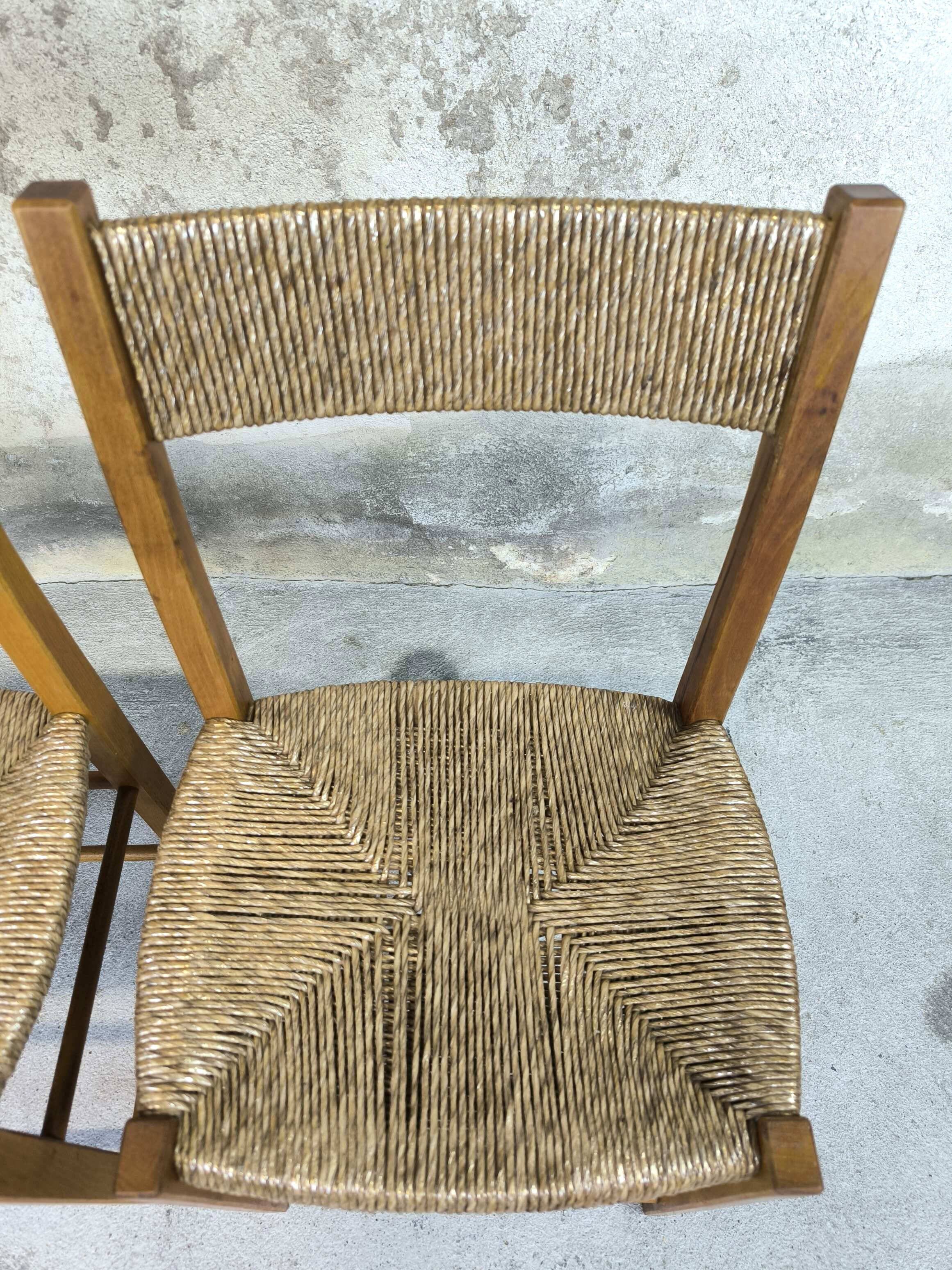 Pair of vintage wood and straw chairs