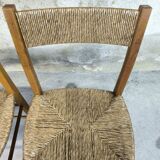 Pair of vintage wood and straw chairs