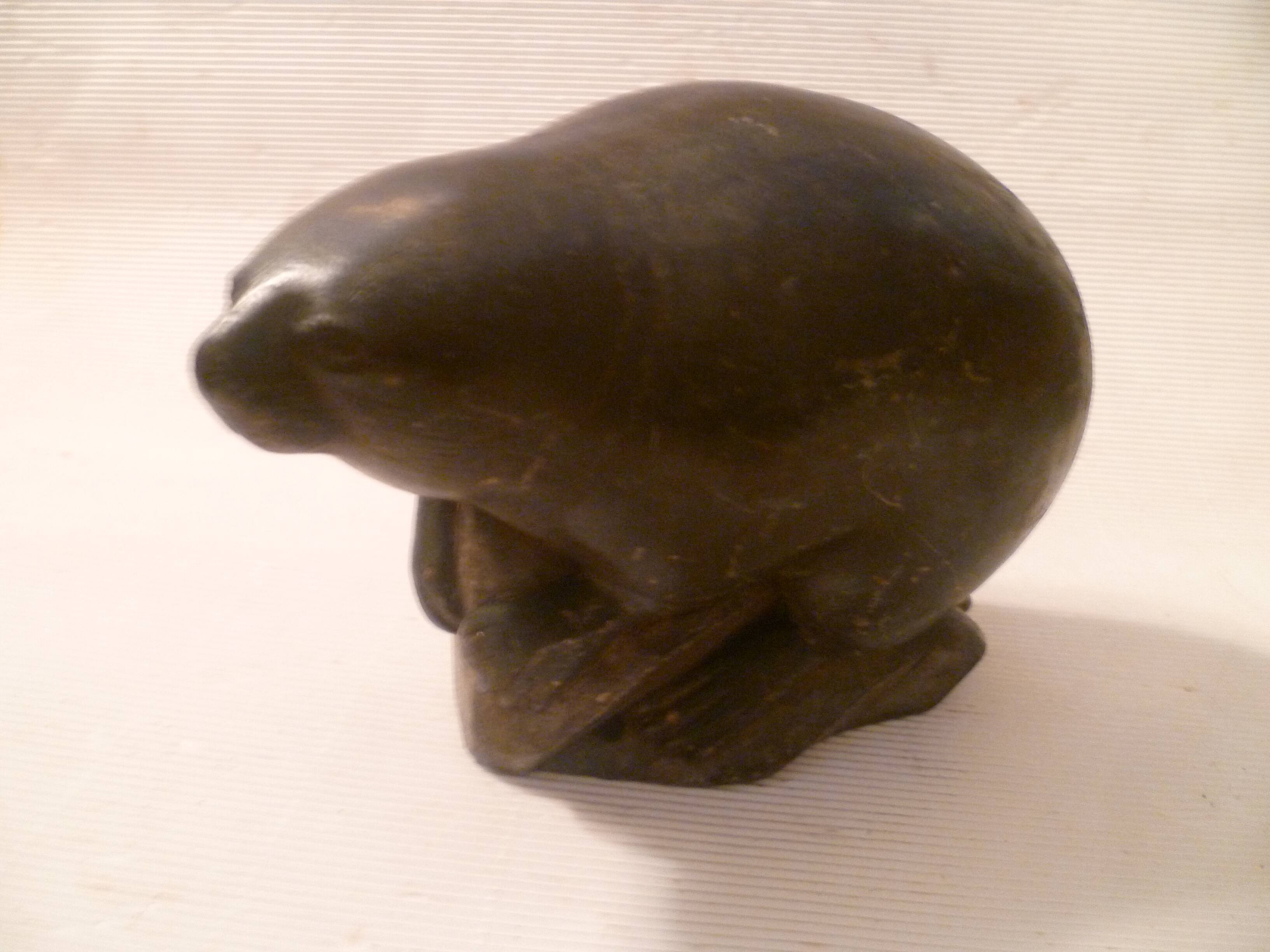 Ancient inuit seal sculpture in stone