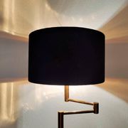 Articulated floor lamp in brass with a velvet shade, 1970.