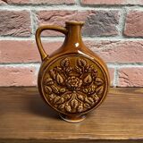 German round vase with floral motif, ornamental brown ceramic jug with handle