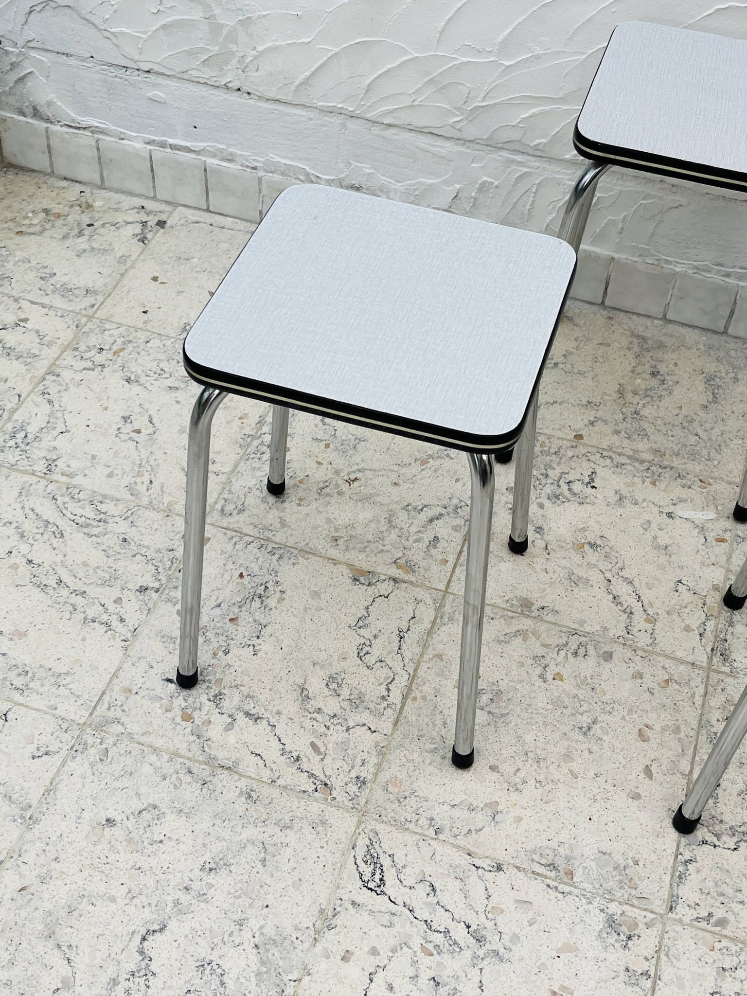 Set of 4 vintage grey chrome Formica stools.