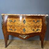 Louis XV style commode with floral marquetry decoration.
