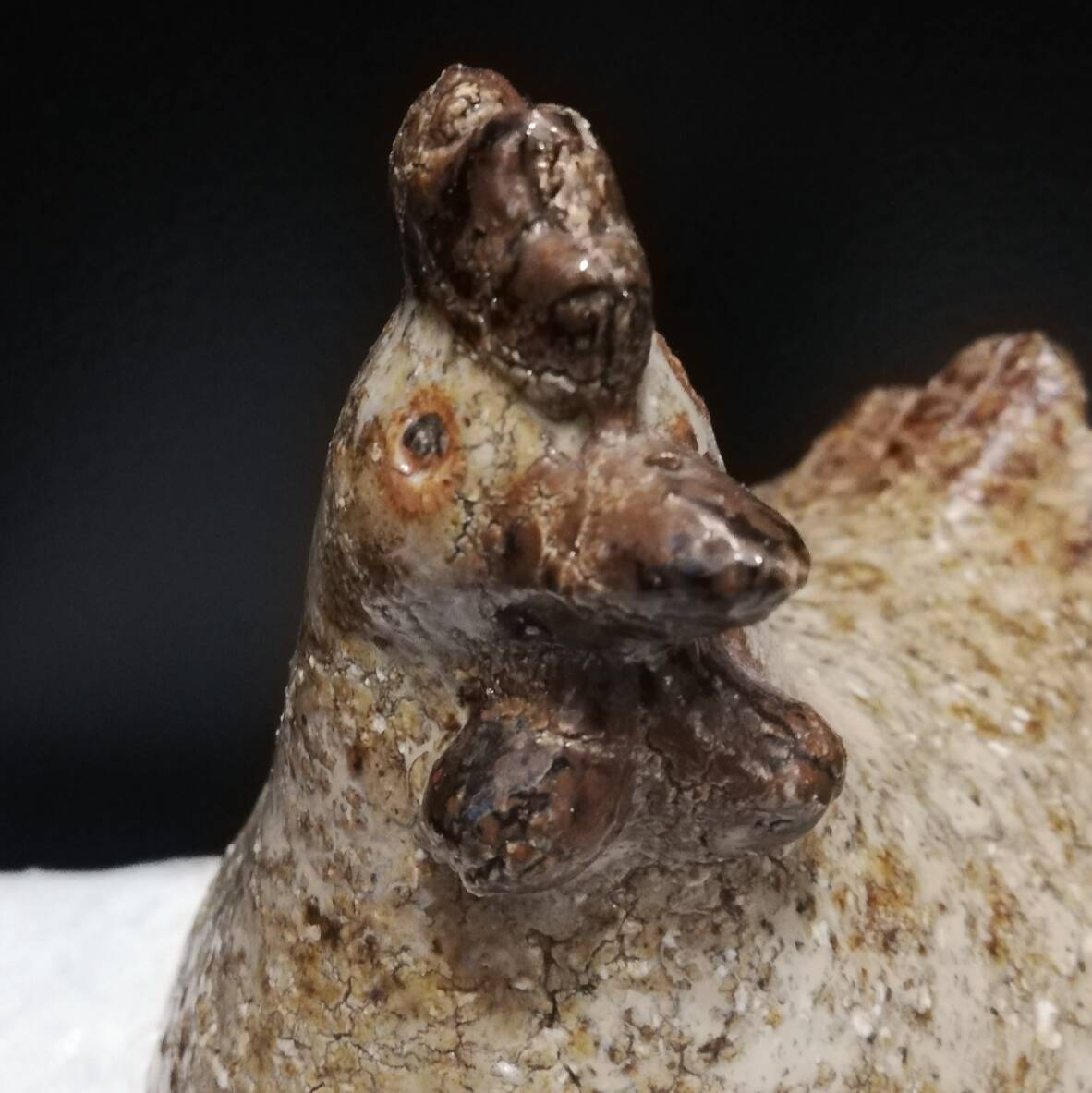 Cracked stoneware hen