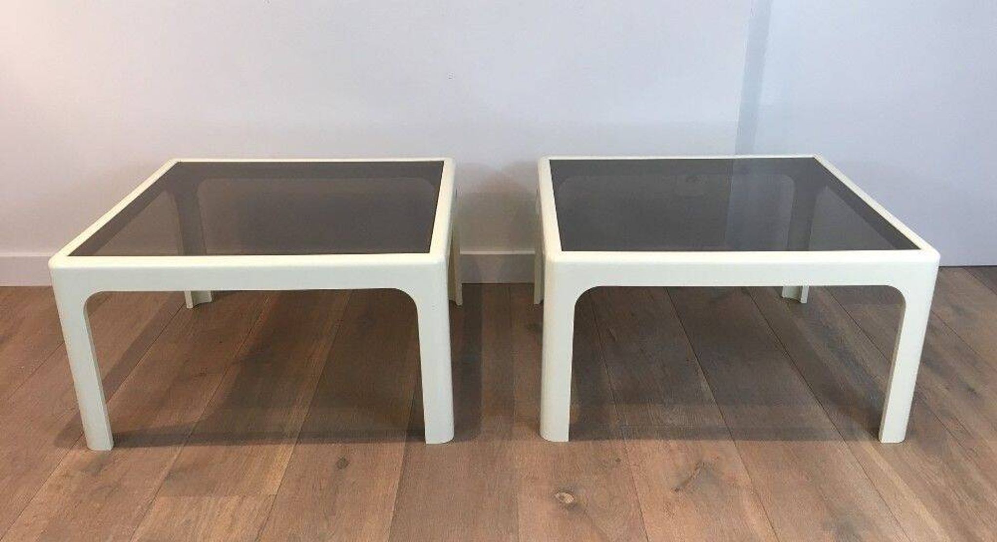 Pair of large white lacquered fiberglass side tables. Poschinger
