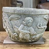 Reconstituted stone planter with hunting decoration