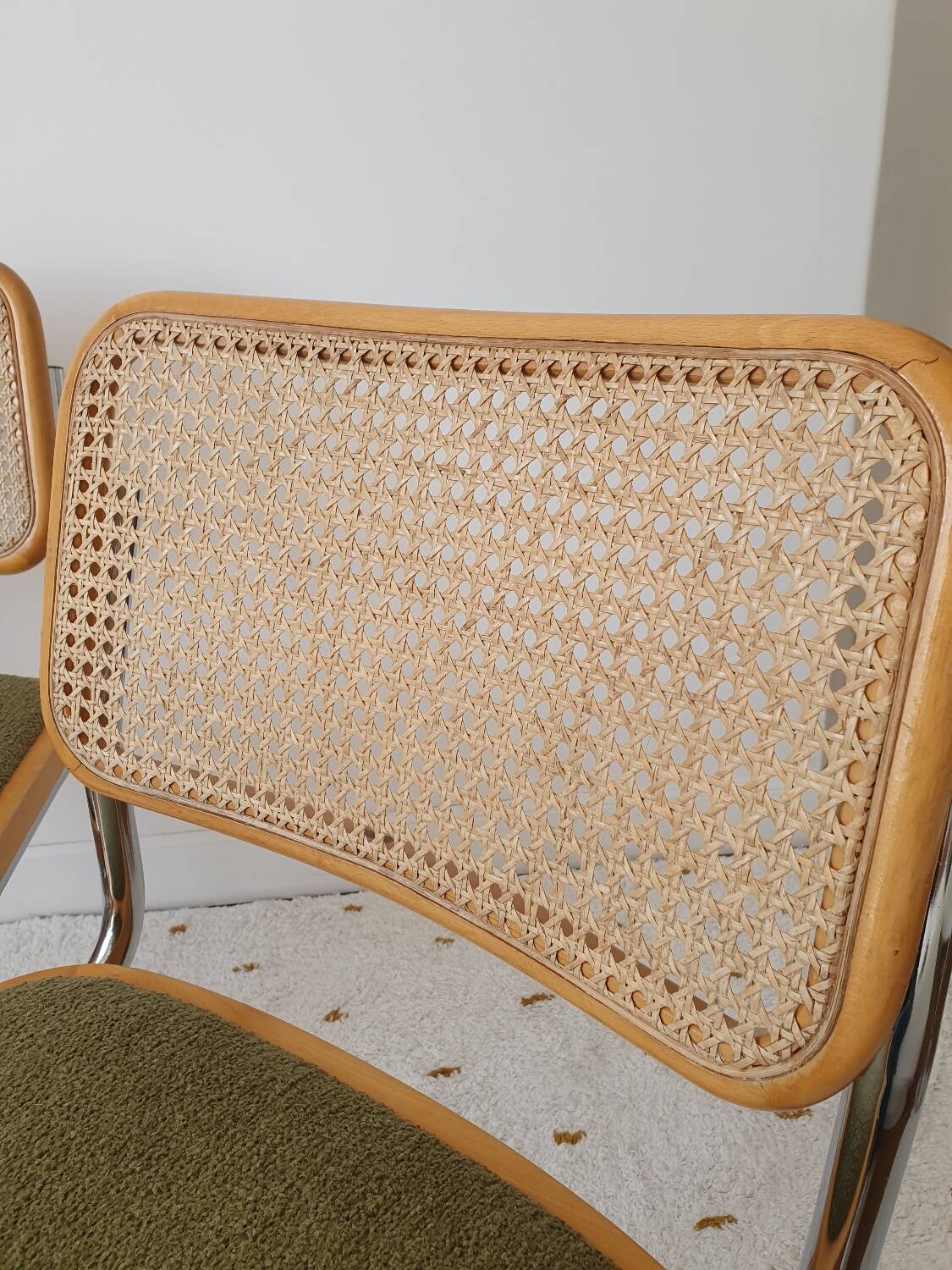 Pair of Marcel Breuer cane and fabric chairs