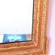 Napoleon III mirror with rich gilded ornamentation