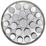 Mirror with round facets design