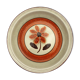 Set 11 plates 1970 Revernay Sarreguemines orange and brown on sandstone background
