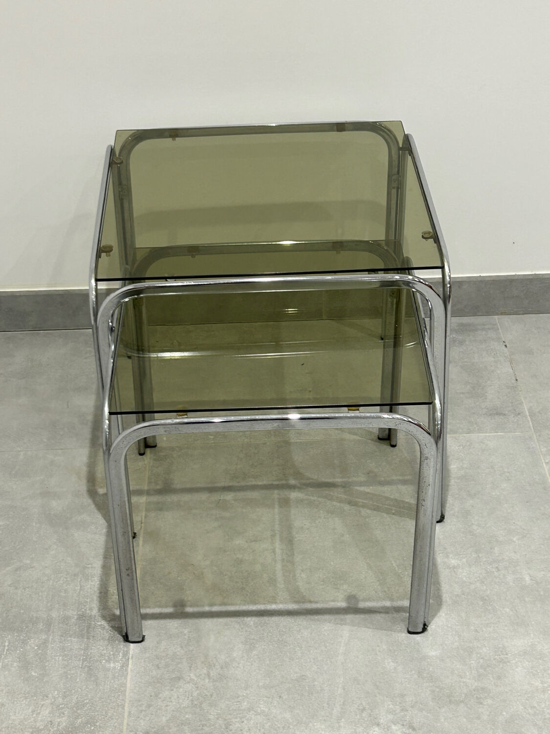Nest of tables in chrome and smoked glass, set of 2.