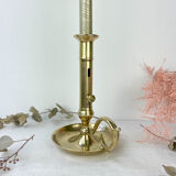 Brass candle holder with pusher late nineteenth century