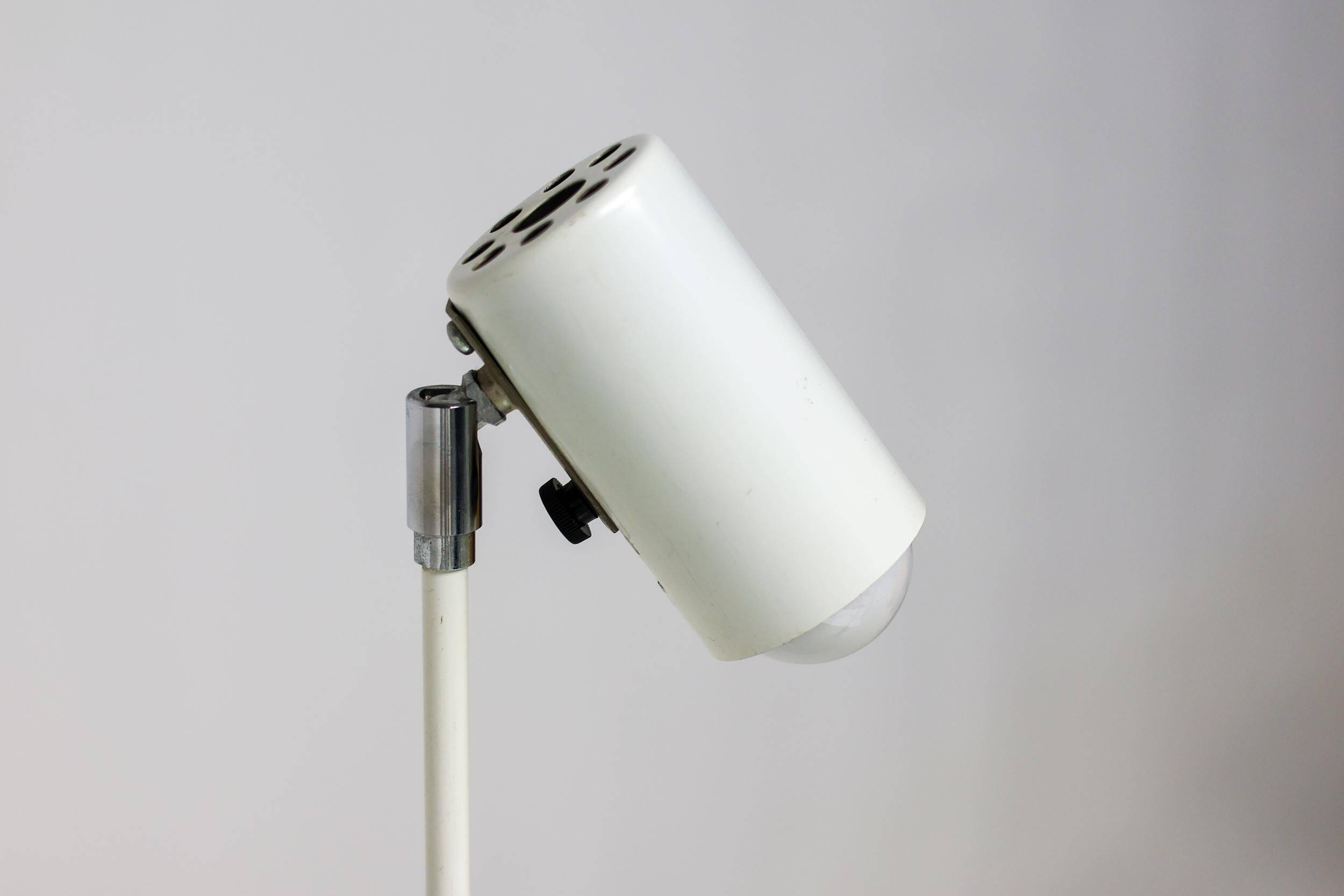 Modern Bauhaus style lamps in white, ideal for the library or study.