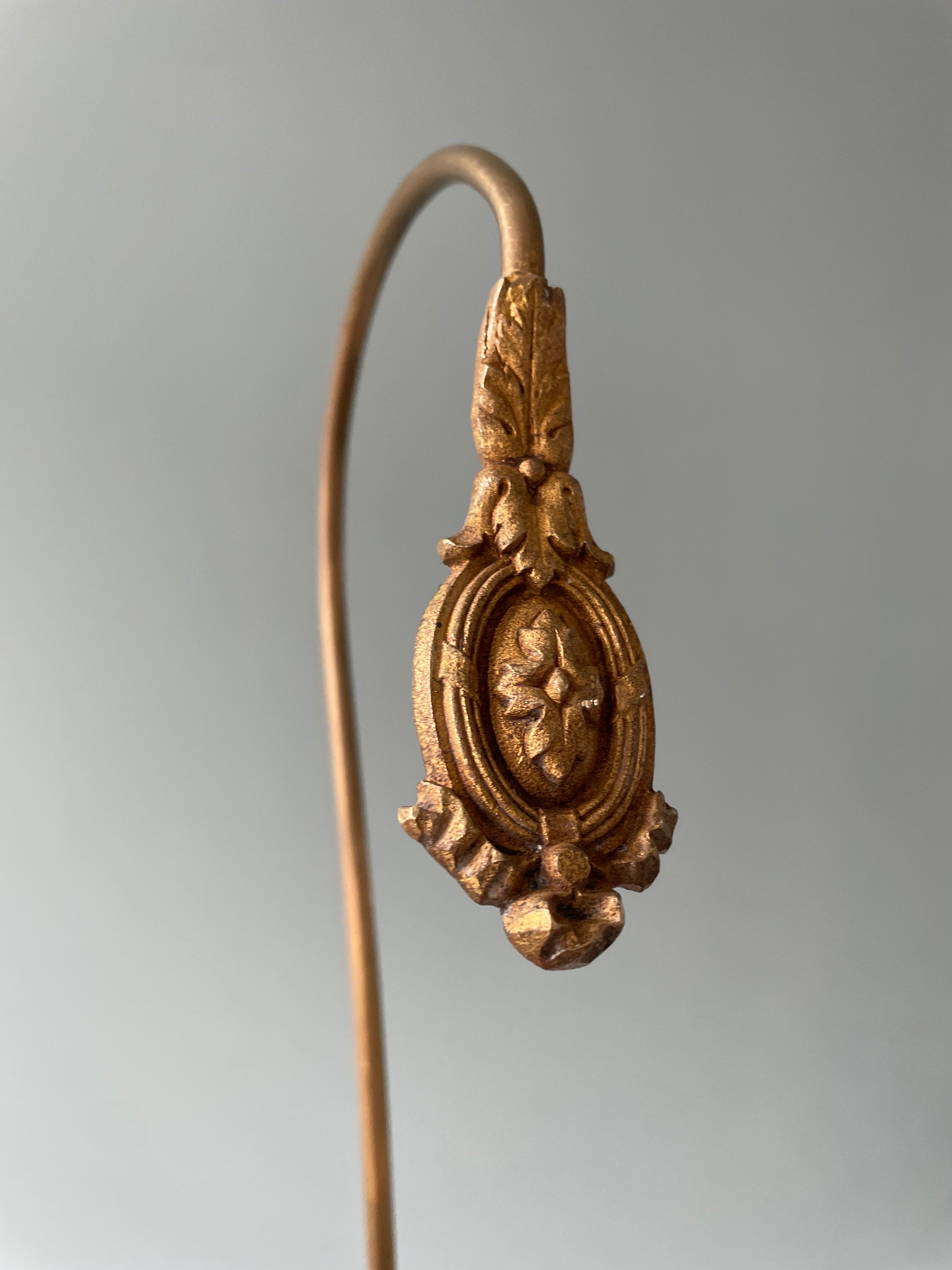 Pair of Napoleon III gilt bronze tiebacks