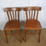 pair of vintage wooden bistro chairs