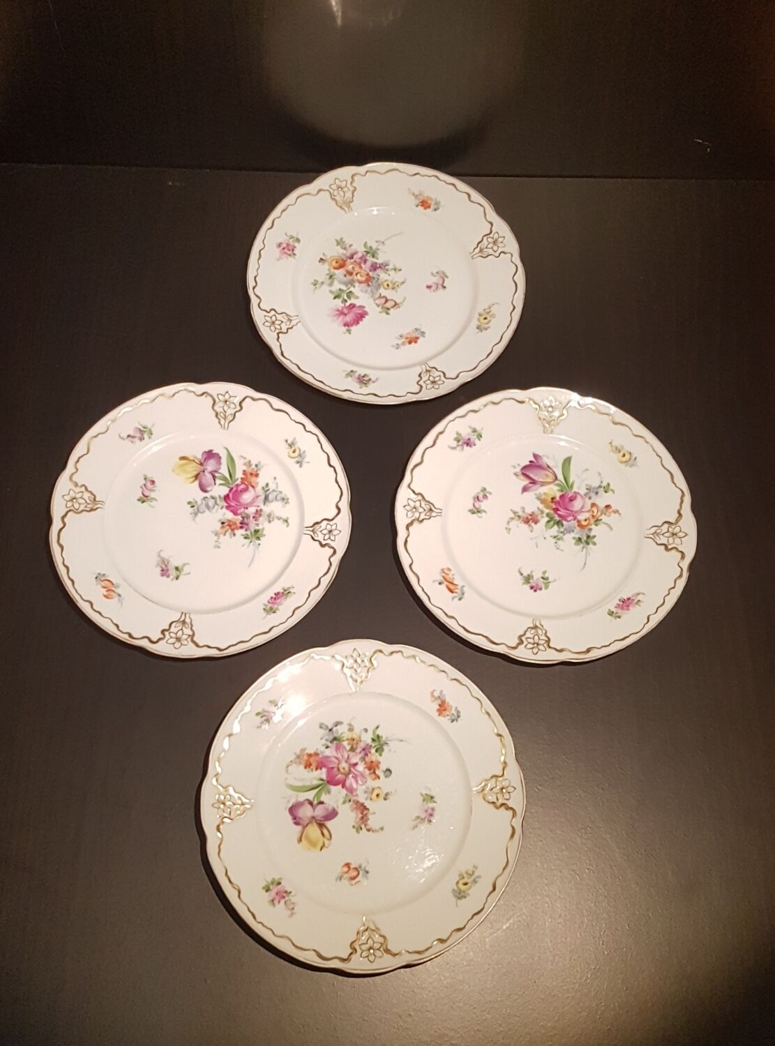 Series of four Dresden porcelain plates