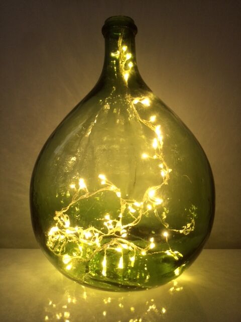 Demijohn with a beautiful glass mixing green and brown