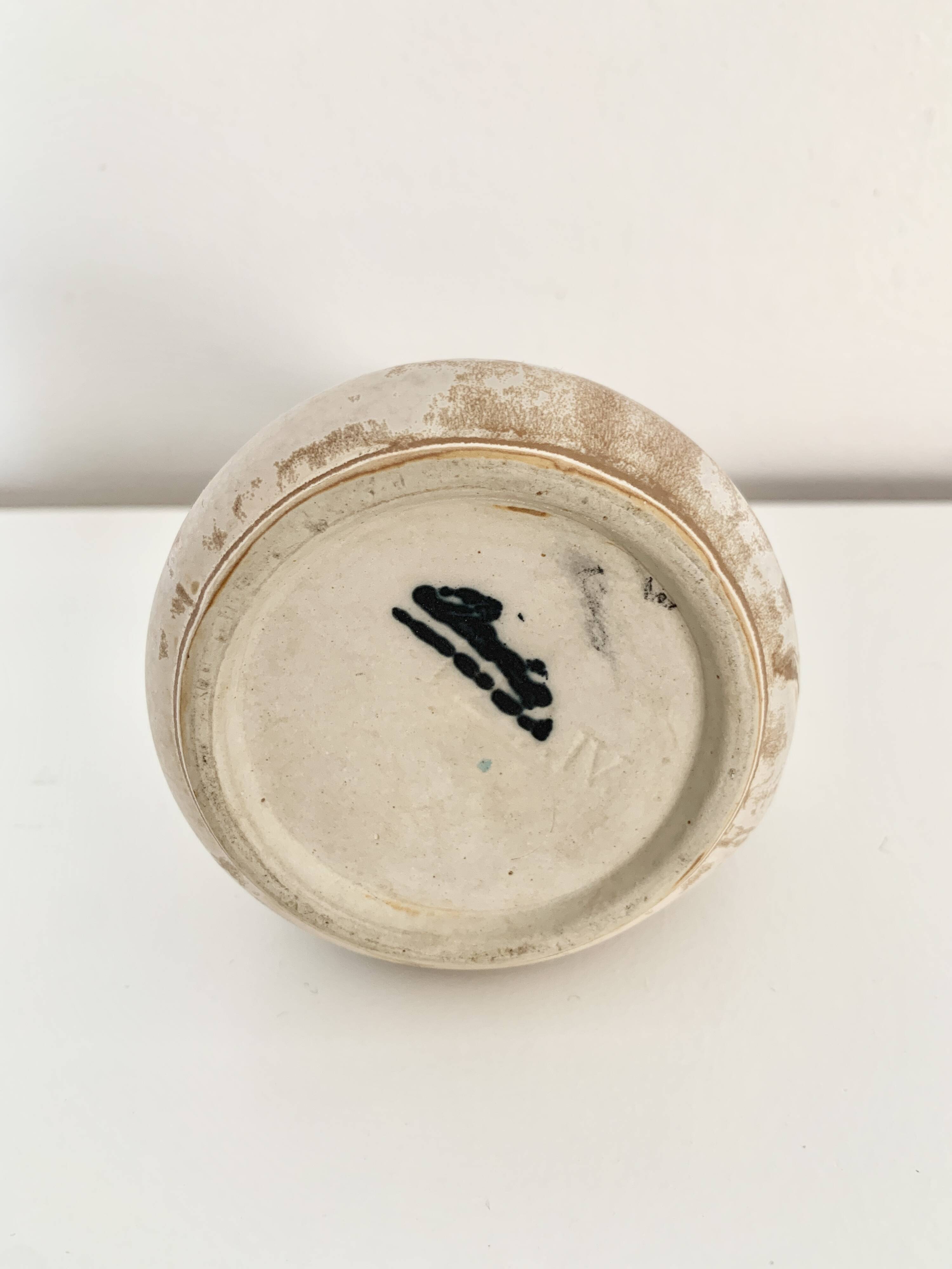 Stoneware jug signed Denbac